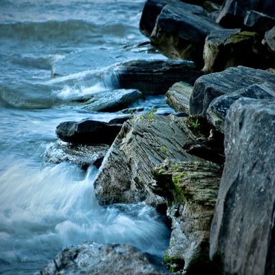 A serene natural element like a smooth stone or water ripple.